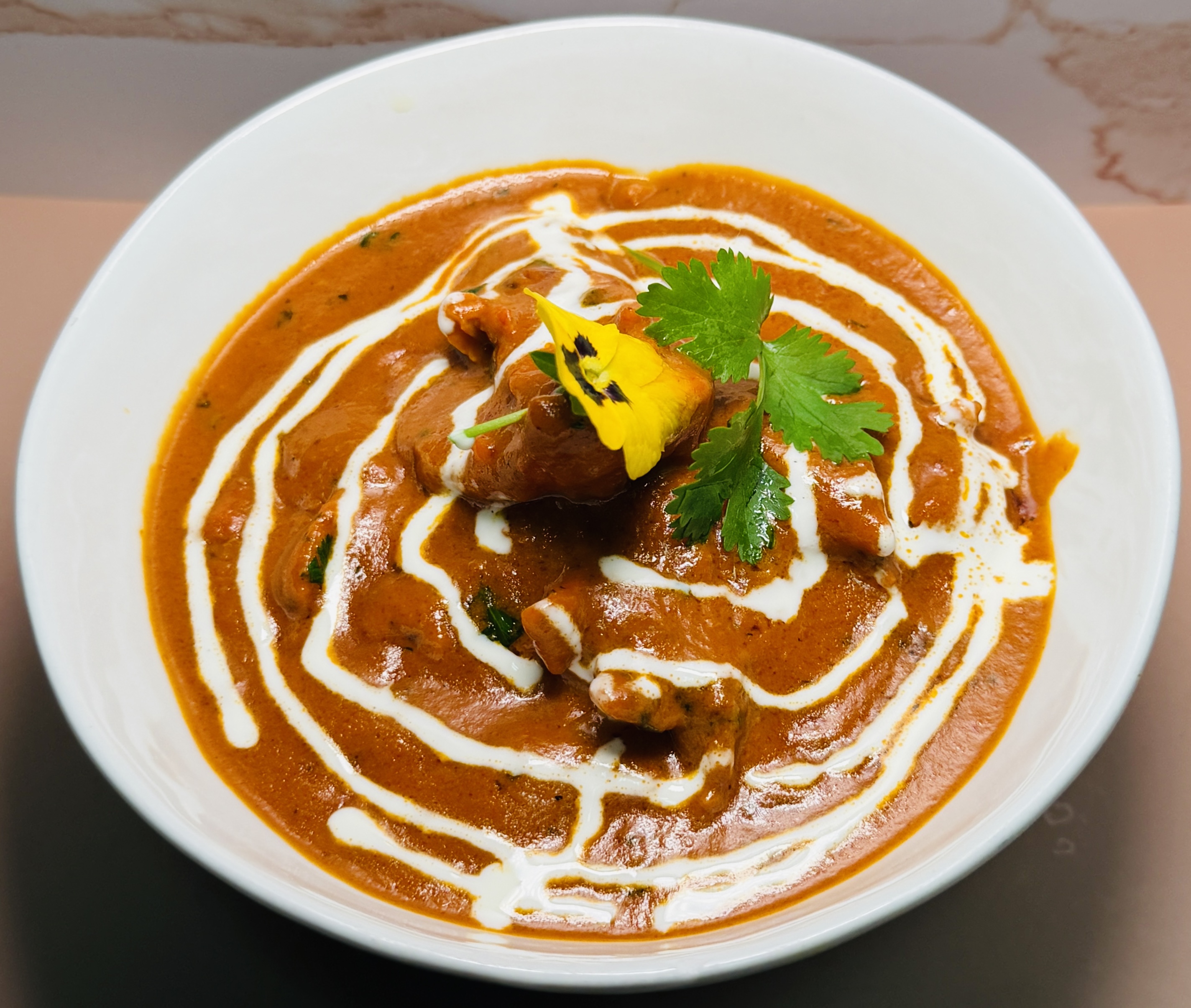 Creamy butter chicken curry with rice