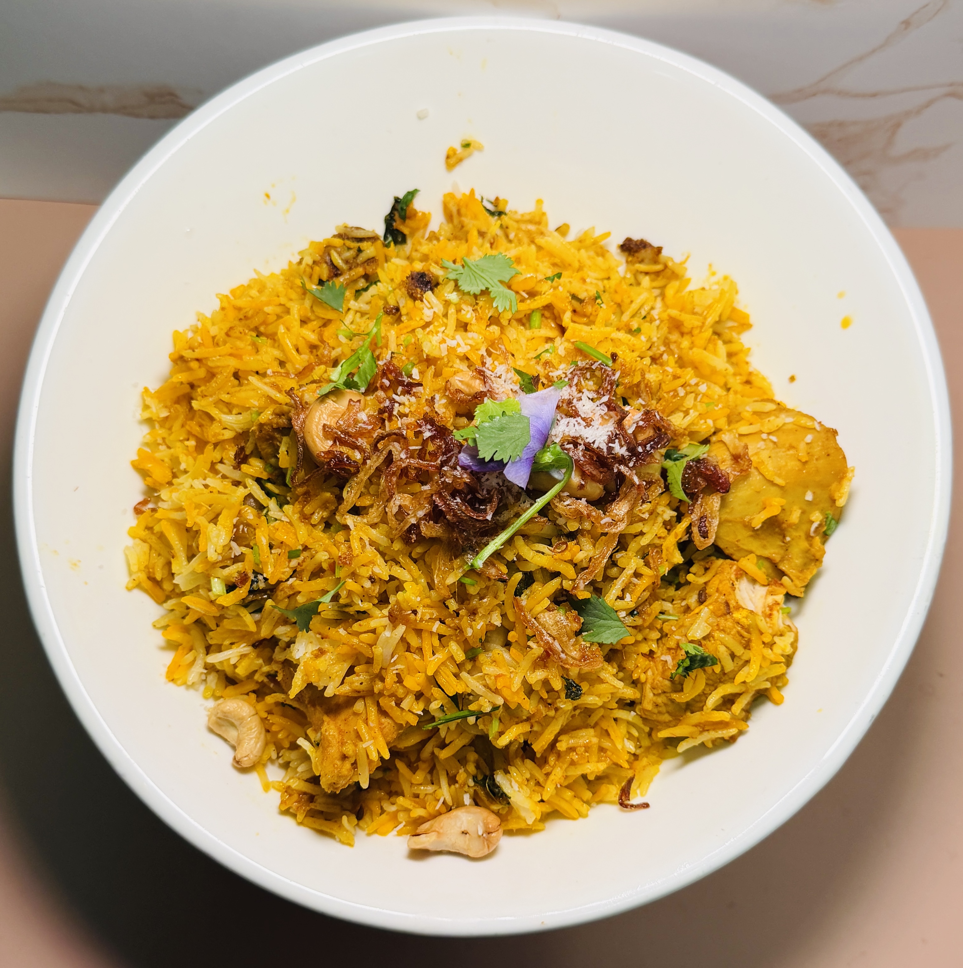 Aromatic chicken biryani with saffron rice