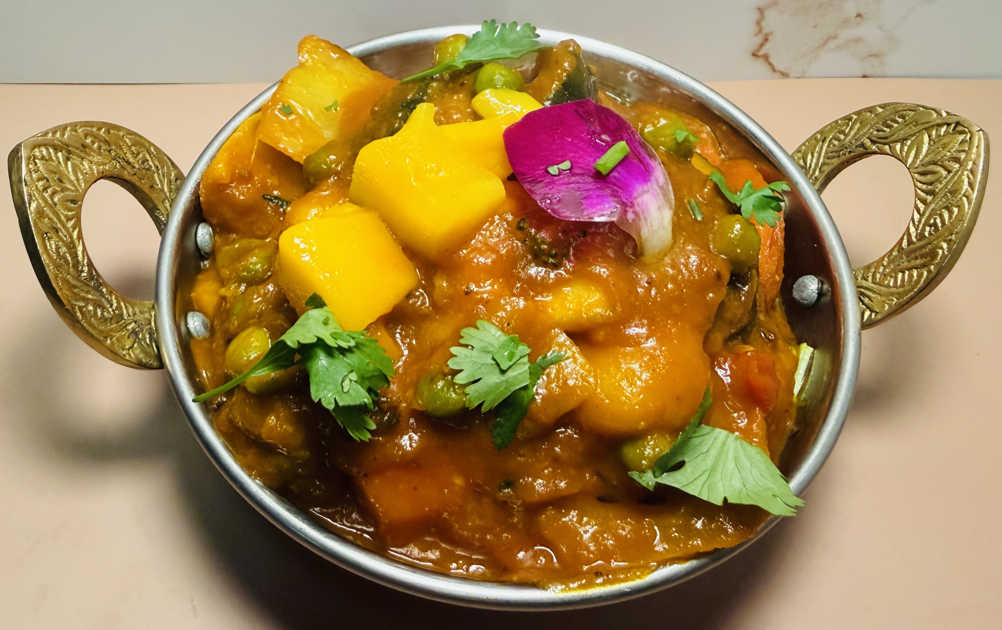 Mixed vegetables mango curry